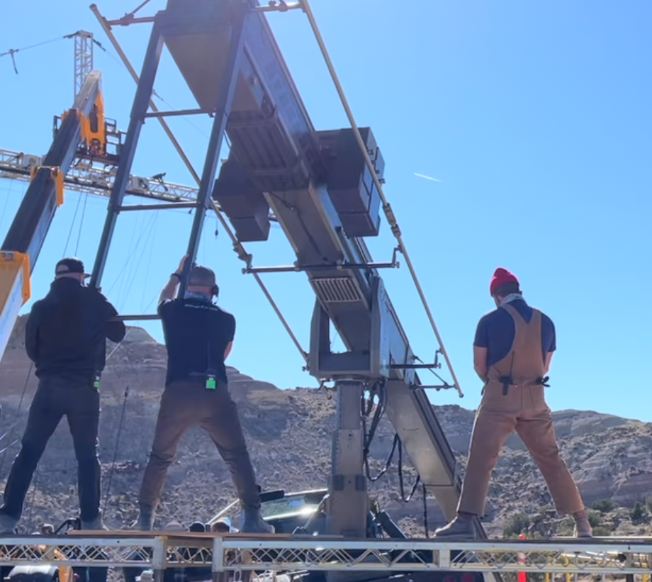 Mike Black (pictured right) working on set for a production.