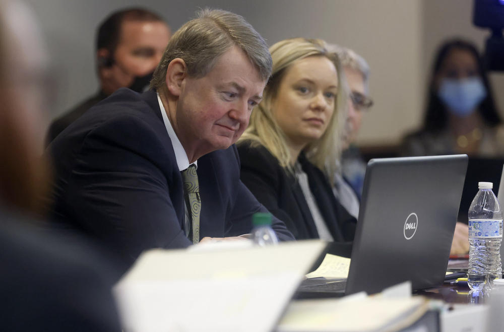 Defense attorney Kevin Gough listens to opening statements in the trial of Greg McMichael and his son, Travis McMichael, and a neighbor, William "Roddie" Bryan at the Glynn County Courthouse, Friday, Nov. 5, 2021, in Brunswick, Ga.