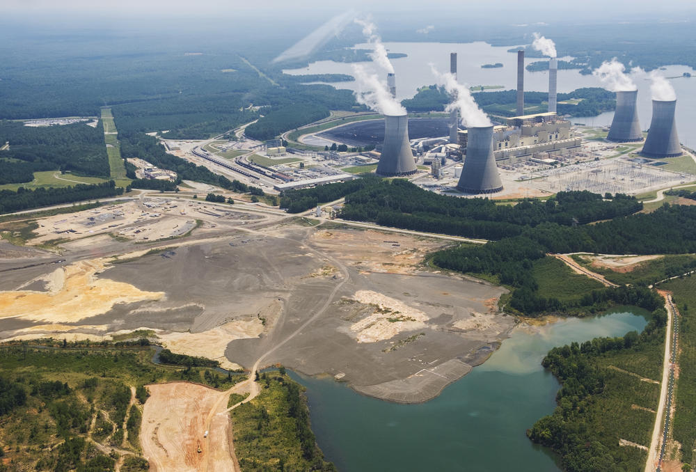 The coal ash pond, foreground, of Georgia Power's Plant Scherer near Juliette in August 2019.
