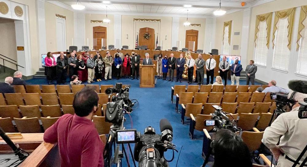Macon-Bibb County Mayor Lester Miller, surrounded by community leaders announces the unveiling of the Macon Violence Prevention Strategic Plan Wednesday morning at City Hall. 