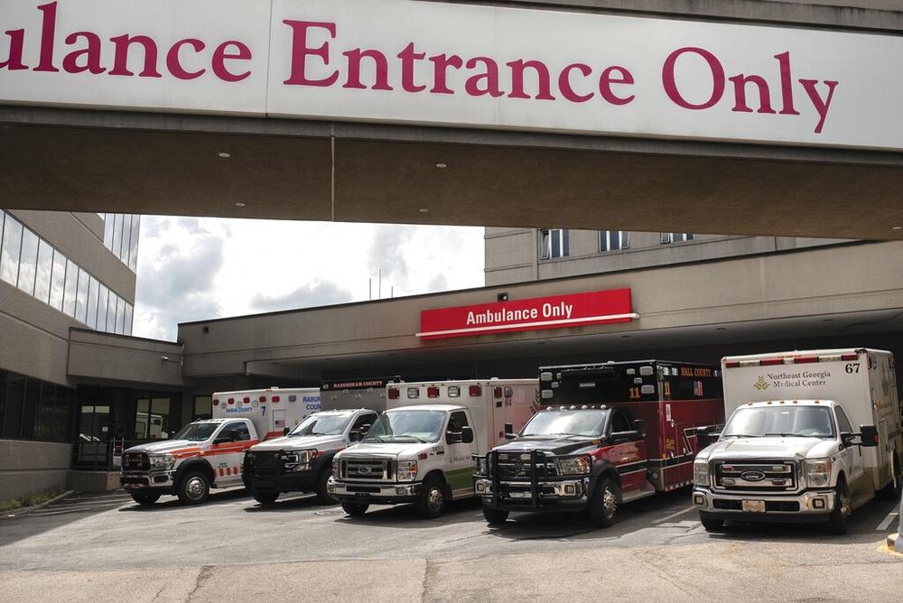 Ambulances from surrounding counties filled the emergency entrance Monday, Aug. 30, 2021, at the Northeast Georgia Medical Center Gainesville, Ga.