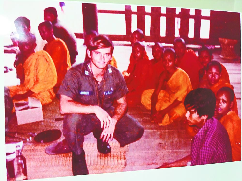 In this 1972 photo, U.S. Air Force Maj. Bobby Jones is shown helping local villagers with their medical issues as a doctor working out of Udorn Royal Thai Air Base in Thailand.