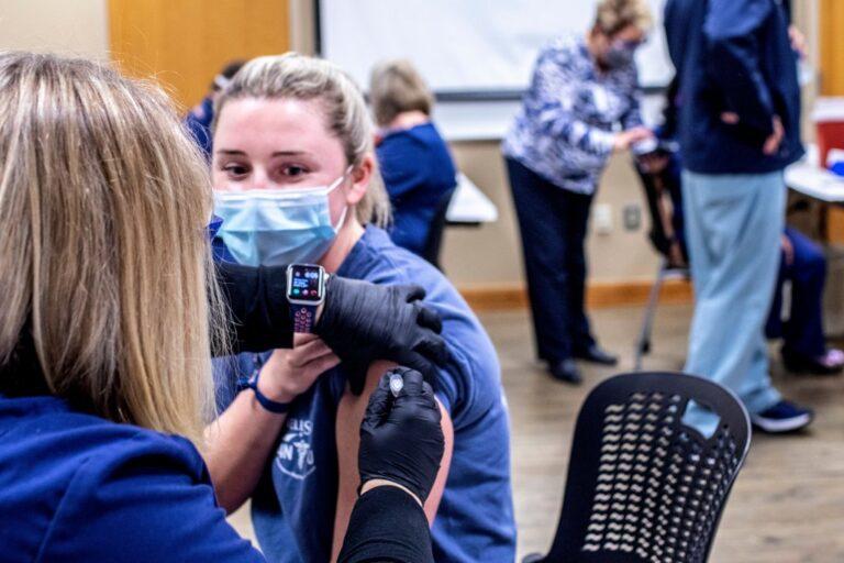  Critical Care Registered Nurse Amanda Earley, who cares for patients in the intensive care unit, was the first WellStar Health System employee to receive the COVID-19 vaccine last December. Photo courtesy WellStar Health System.