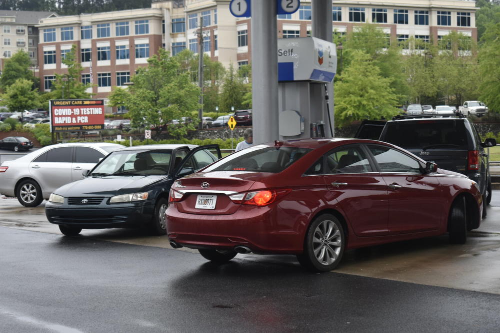 Drivers lined up to fill their tanks at a Cherokee County gas station in May 2021 after the cyberattack on Colonial Pipeline interrupted fuel supplies. 