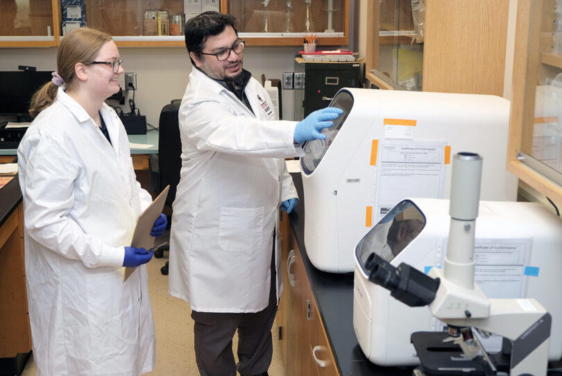 UGA researcher Issmat Kassem, pictured to the right of research professional Miranda Barr, has discovered a gene that causes bacteria to be resistant to antibiotics in Georgia sewer water.