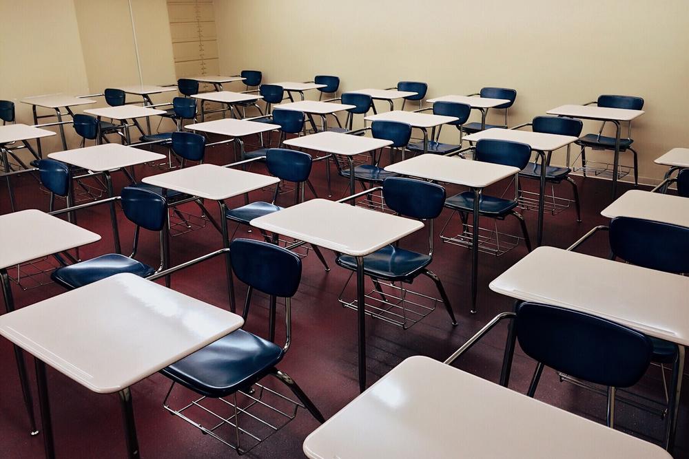 empty classroom with desks