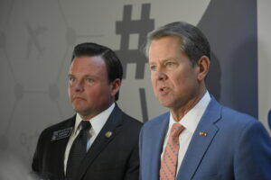 Sen. Clint Dixon and Gov. Brian Kemp. 