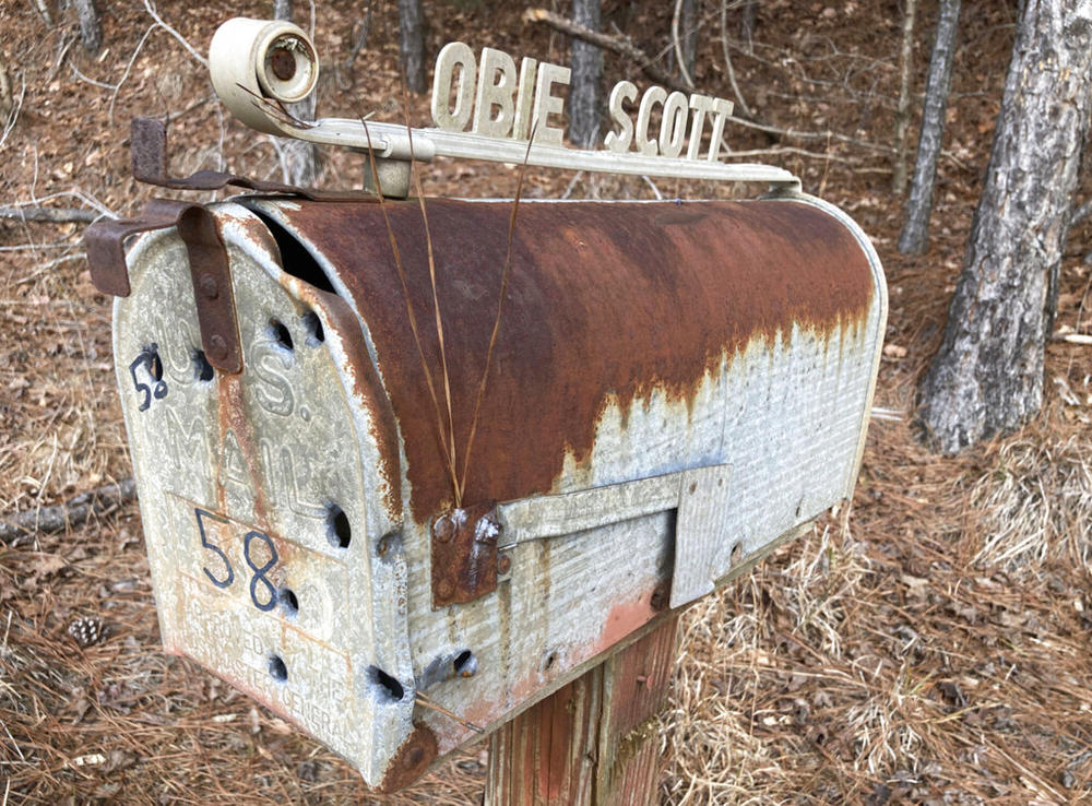 The bullet-pocked mailbox outside the house were Martin Luther King Jr. and Coretta Scott were married in 1953 is shown near Marion, Ala., on Monday, Jan. 24, 2022. Long vacant, the house is not open to visitors and doesn't have a sign or historical marker. The mailbox still bears the name of Coretta King's father, Obie Scott, who died in 1998.