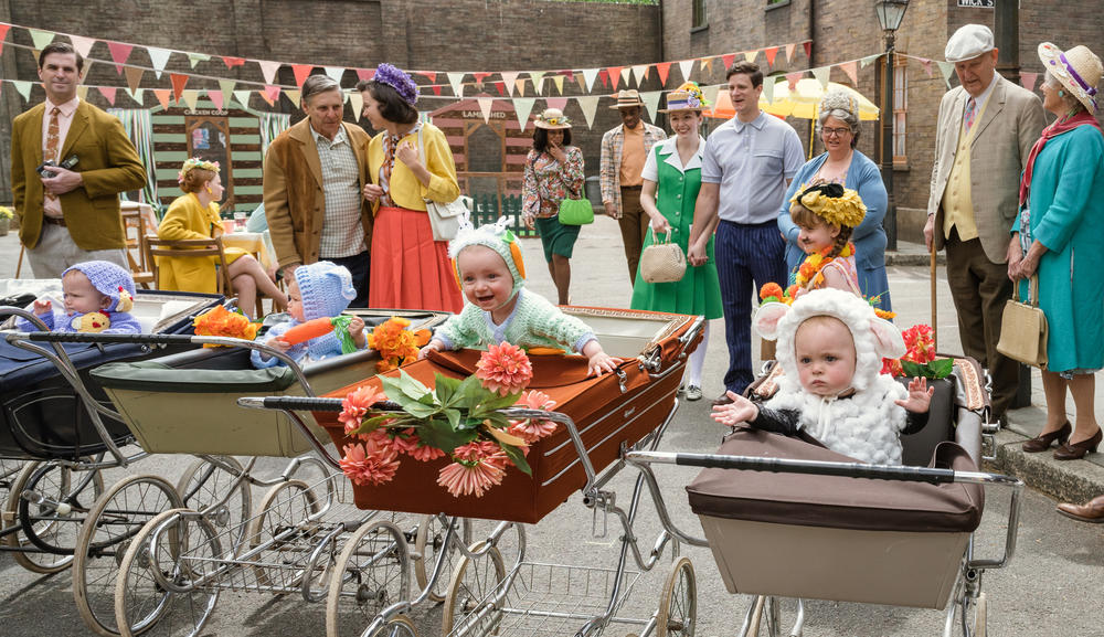 Babies dressed up for an Easter festival.