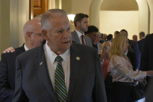  Speaker David Ralston waits in line ahead of Congresswoman Marjorie Taylor Greene. 