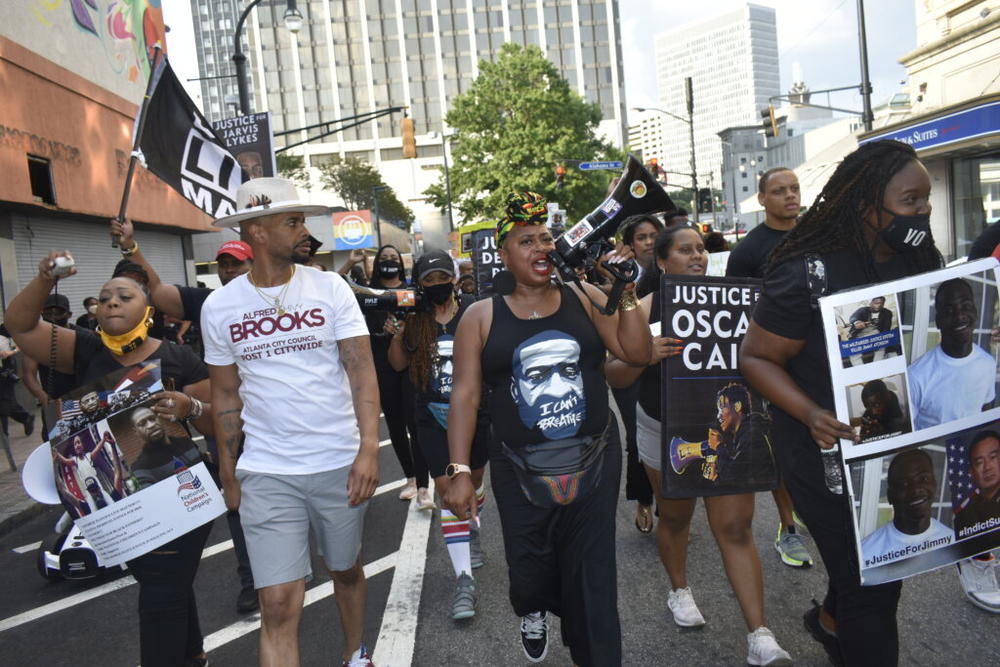  On Tuesday, the Georgia Senate Judiciary Committee advanced a controversial bill that would impose stiffer criminal penalties on protesters when violence or property damage occurs, puts local governments on the hook if protests turn violent and require a permit to hold rallies. Protesters marched down the streets of Atlanta on the anniversary of George Floyd’s murder.
