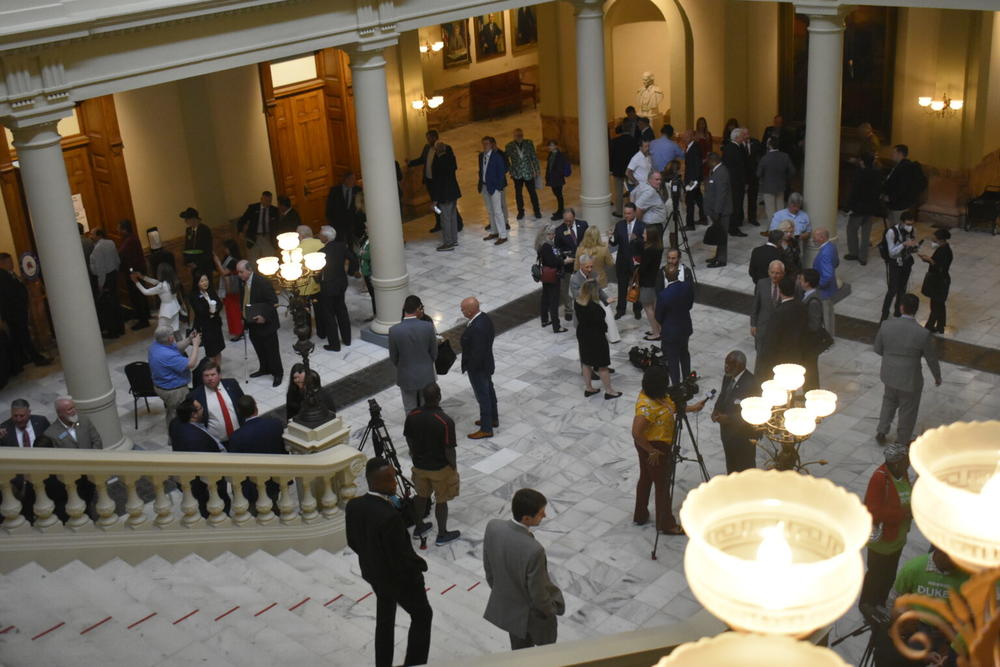 Politicians, their supporters and members of the press filled the Georgia Capitol Monday, the first day to qualify to run for office this year. 