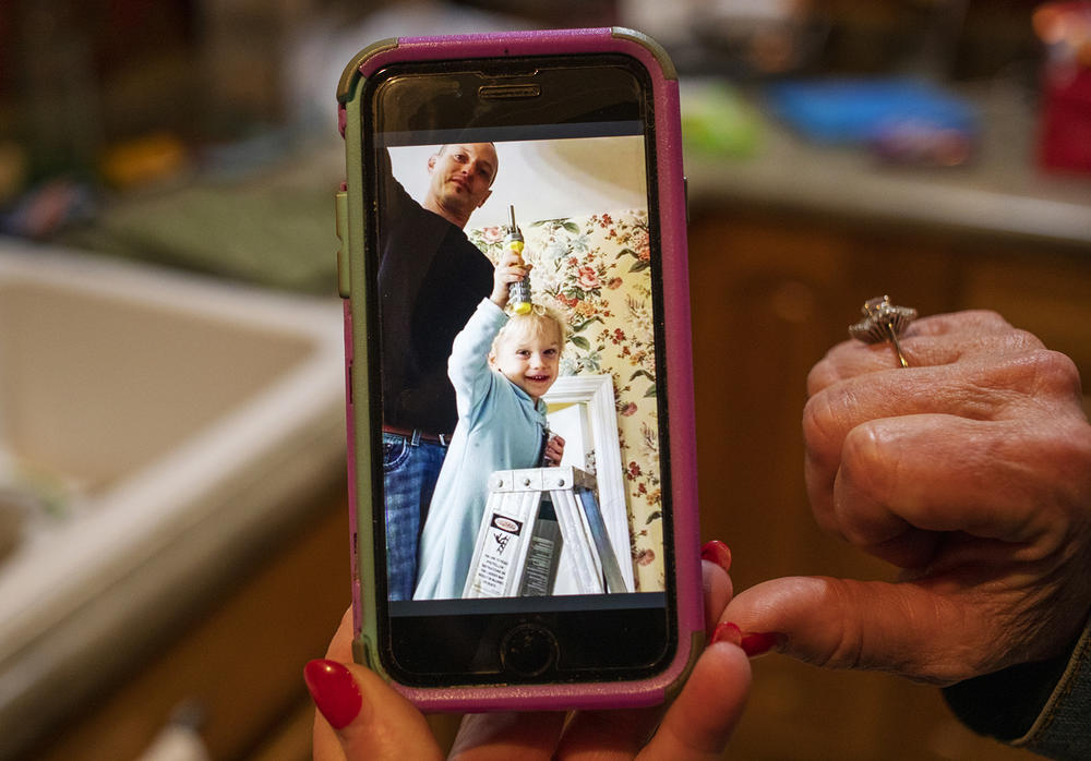 A photo of Joshua Lester, left, and his son Memphis, on Nancy Masters' phone. 