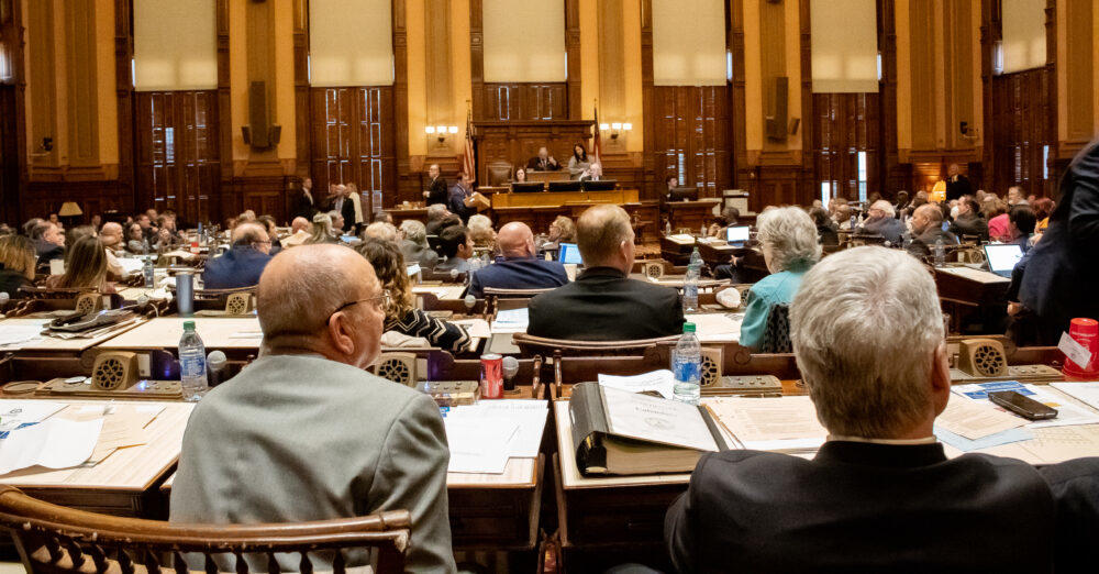 Lawmakers sit in the House chamber at the Georgia state Capitol on March 15, 2022.