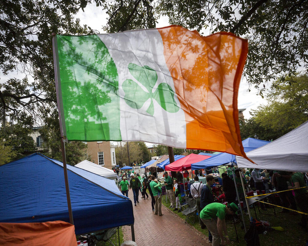 Revelers prepare for the 195-year-old St. Patrick's Day parade on one of the city's historic squares, Saturday, March 16, 2019, in Savannah, Ga. Savannah is gearing up for a big comeback of its most profitable holiday Thursday, March 17, 2022, as its beloved St. Patrick's Day parade returns for the first time since 2019.
