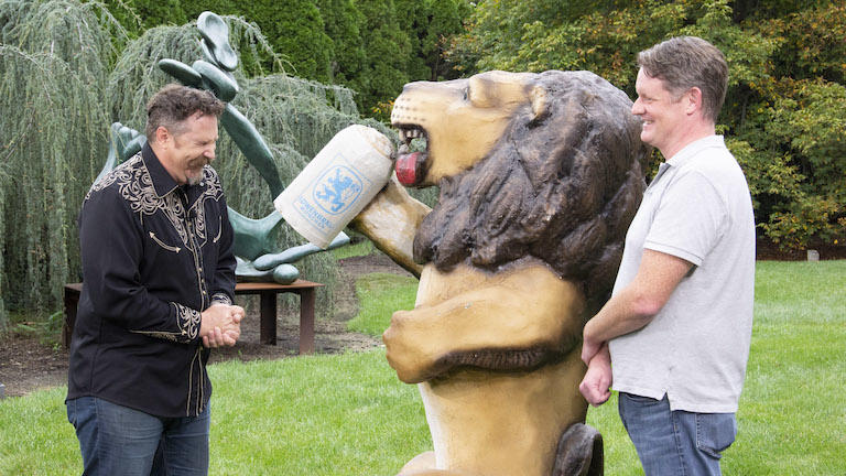 James Supp appraises a Löwenbräu lion display.