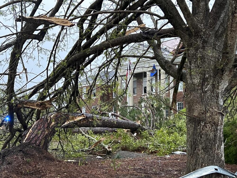 The Bryan County Courthouse was damaged and trees broken in half, Tuesday, April 5, 2022, after a storm passed through the city of Pembroke, Ga., 30 miles from Savannah, Ga. 