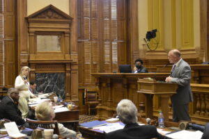 From left, Sen. Jen Jordan and Sen. Bruce Thompson debate his bill that would ban mail-order abortion pills.
