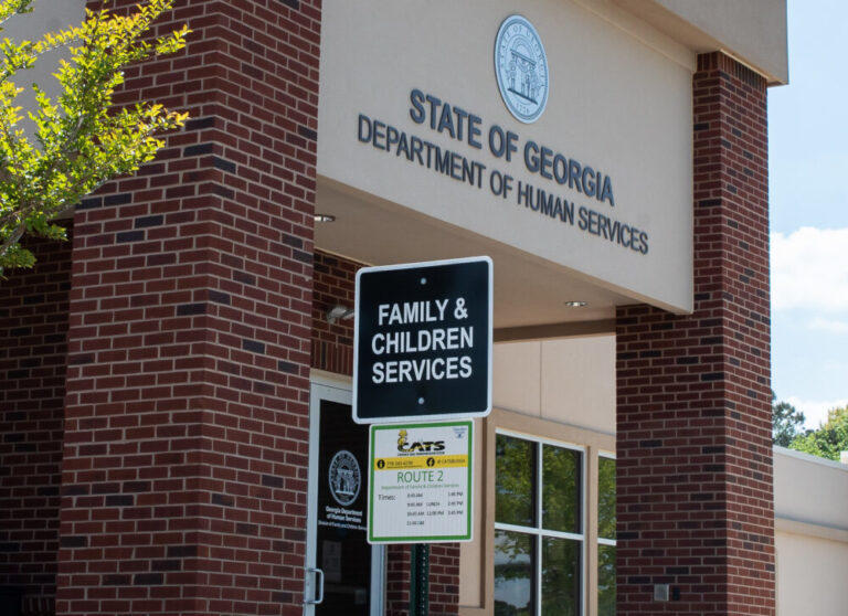 A sign shows the entrance to the Department of Family and Children Services in Canton, Ga. on April 22, 2022.