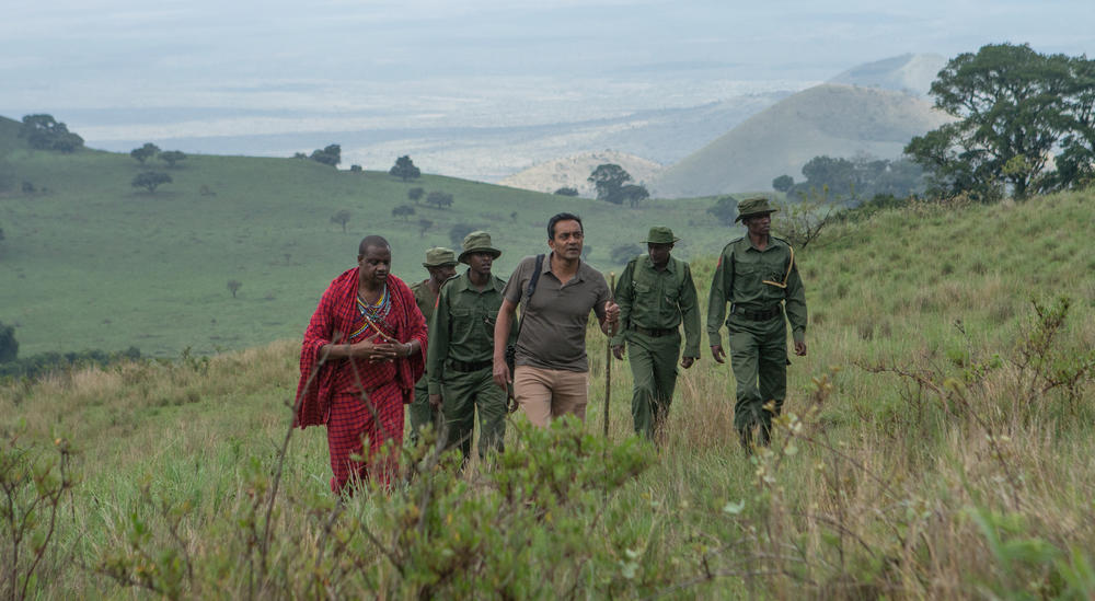 Sanjayan Muttulingam and rangers in Kenya's Chyulu Hills.