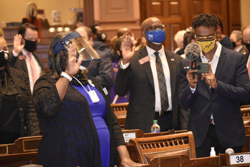  State Rep. Sandra Scott said she’ll sometimes take her mask off for pictures depending on the circumstances. She’s shown here wearing a face shield on the state House floor during the 2021 General Assembly.