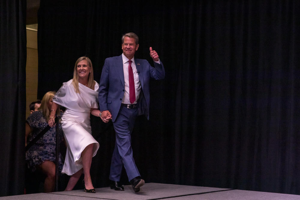Gov. Brian Kemp and his wife Marty take the stage at his victory party after the May 2022 primary.