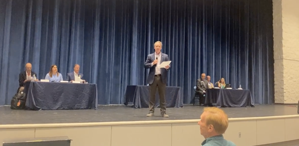 Opponents and proponents of the East Cobb cityhood movement debated May 4, 2022, before a crowd of more than 200 residents at Pope High School.