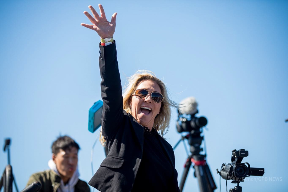 Rep. Marjorie Taylor Greene waving. 