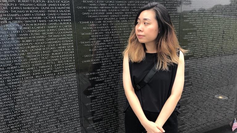 A woman at a memorial.