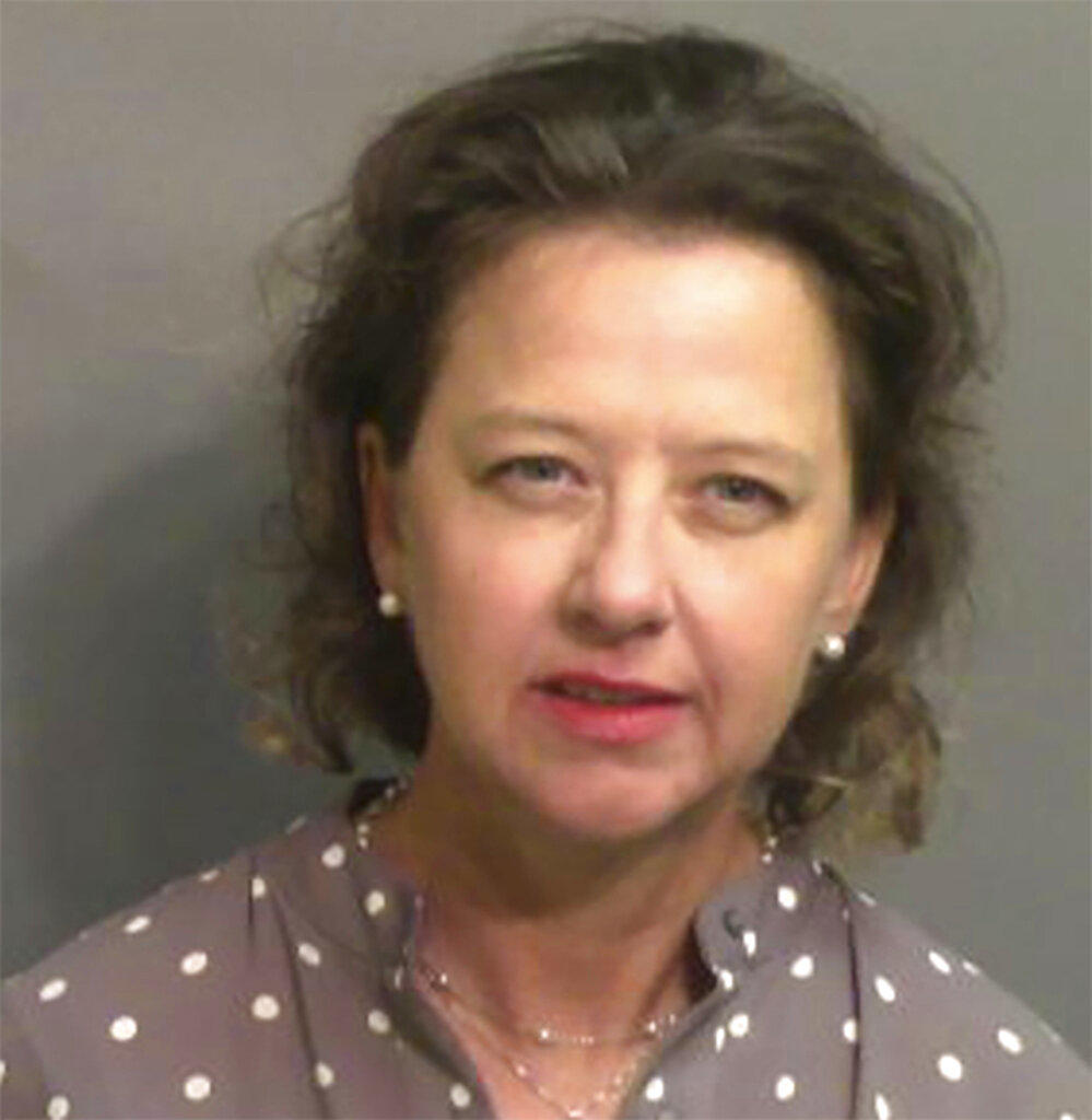 This jail booking photo provided by Glynn County Sheriff's Office, shows Jackie Johnson, the former district attorney for Georgia's Brunswick Judicial Circuit, after she turned herself in to the Glynn County jail in Brunswick, Ga, on Wednesday, Sept. 8, 2021.