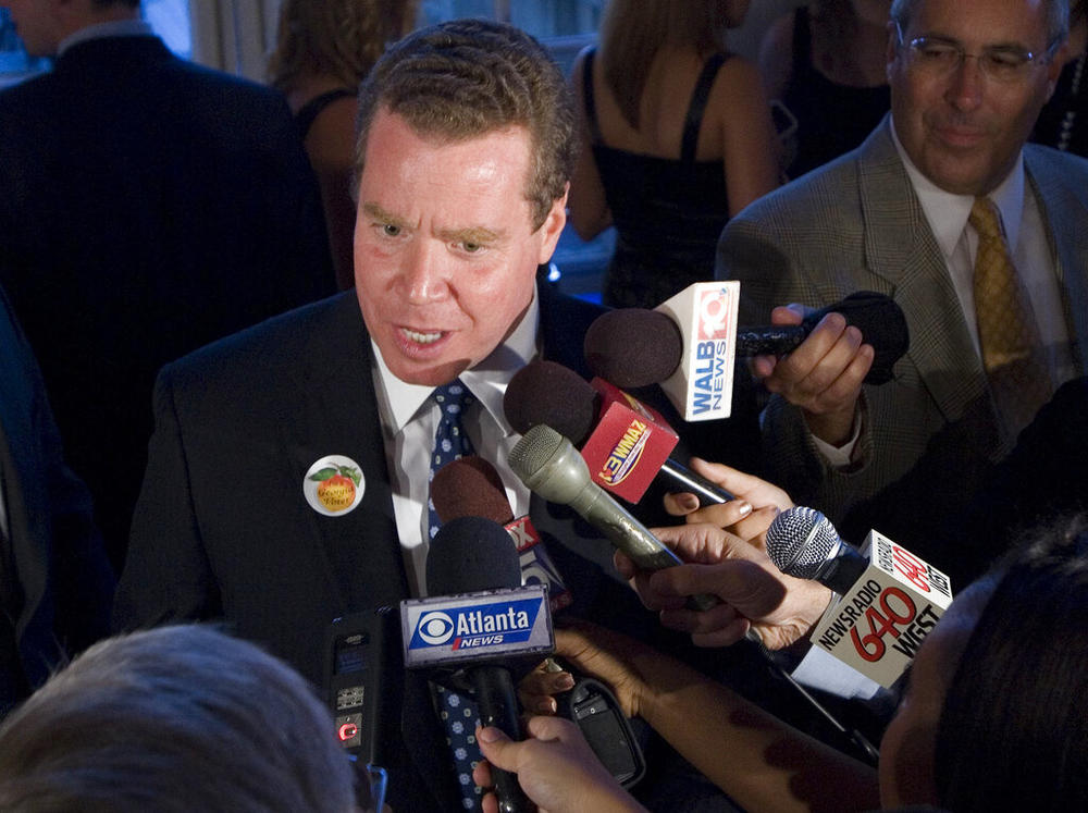 Republican John Oxendine talks to reporters in Atlanta, July 20, 2010, during his unsuccessful bid for the GOP nomination for Georgia governor. Oxendine agreed on Thursday, May 12, 2022 to settle a state ethics case that alleged Oxendine was misusing leftover money from that campaign by giving $128,000 to the state of Georgia.