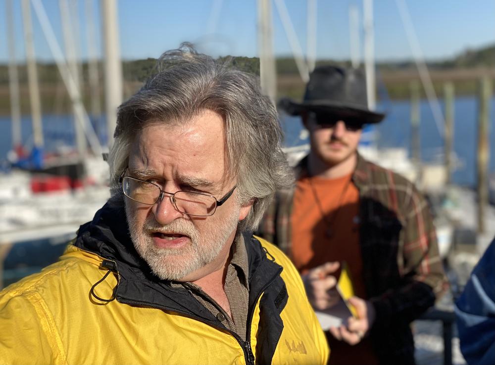 Georgia Southern University history professor Kurt Knoerl gives instructions to his maritime history students on the dock of Young's Marina.