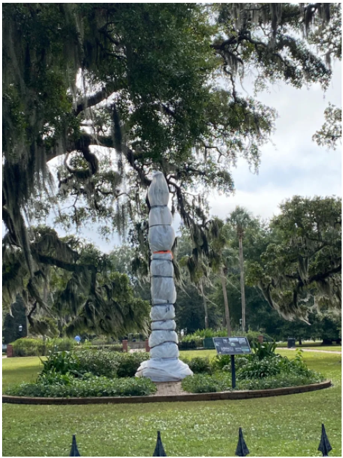 The Confederate monument in Brunswick’s Hanover Square is wrapped in plastic during the trial for three men accused of killing Ahmaud Arbery. 