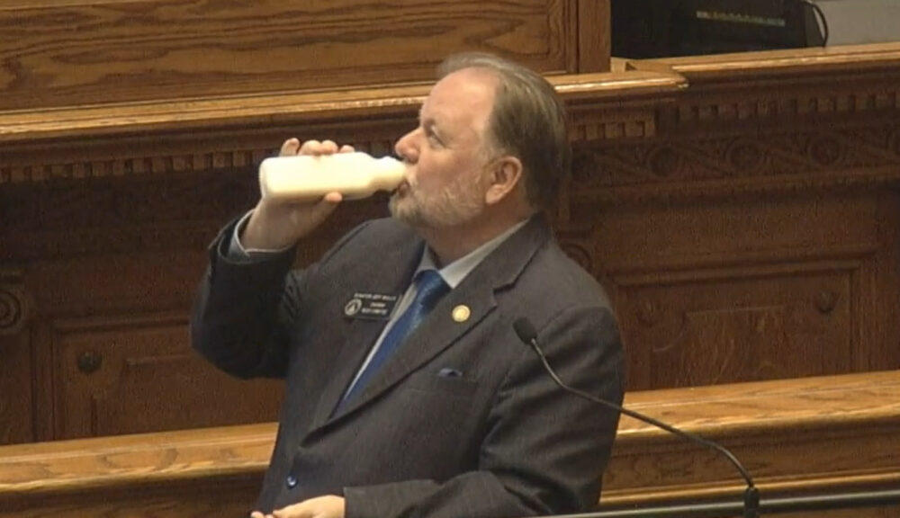 Republican Sen. Jeff Mullis of Chickamauga drinks raw milk, marked for pet consumption, while presenting a bill to legalize it for human consumption during the Senate floor session in this screenshot on April 1, 2022.