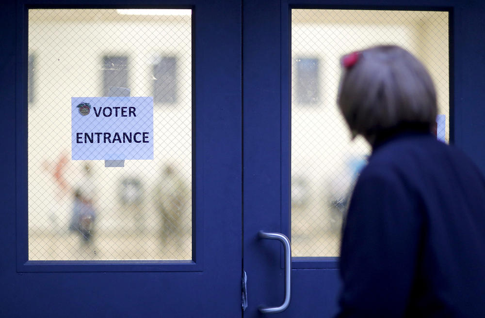 A voter nears the entrance for a polling location in Atlanta, Georgia.