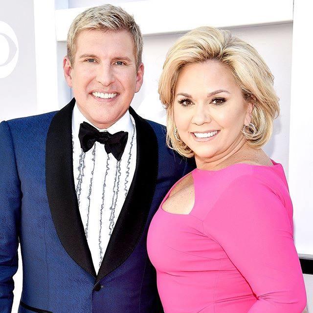 Todd Chrisley, left, and his wife, Julie Chrisley, pose for photos at the 52nd annual Academy of Country Music Awards on April 2, 2017, in Las Vegas. The couple, stars of the reality television show “Chrisley Knows Best,” have been found guilty in Atlanta on federal charges including bank fraud and tax evasion Tuesday, June 7, 2022.