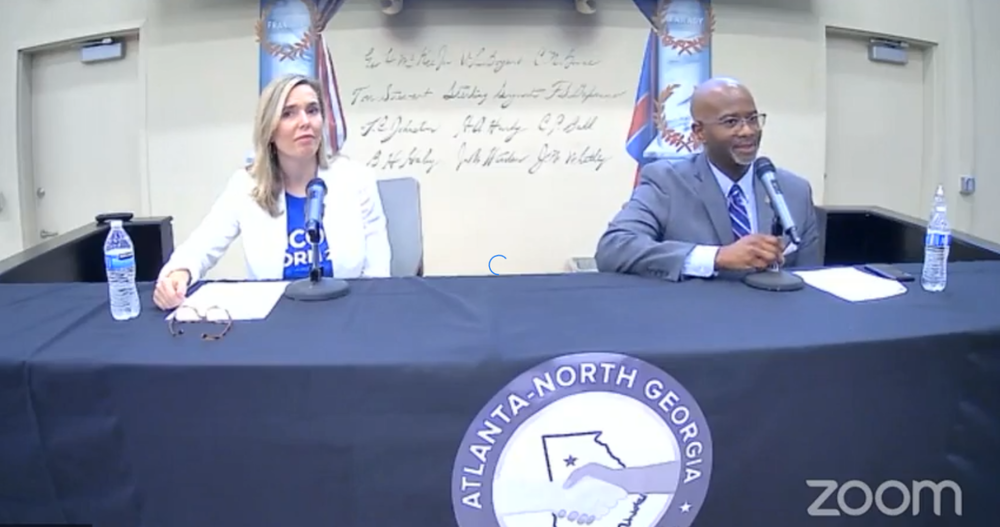  Nicole Horn, left, and state Rep. William Boddie speak at a forum presented by the Atlanta-North Georgia Labor Commission.