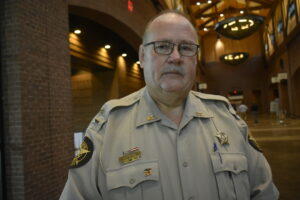 Sgt. Jerry Walters of Worth County at the Columbus Convention and Trade Center. Walters is wearing a pin given to him by a former student who said he helped her succeed. 