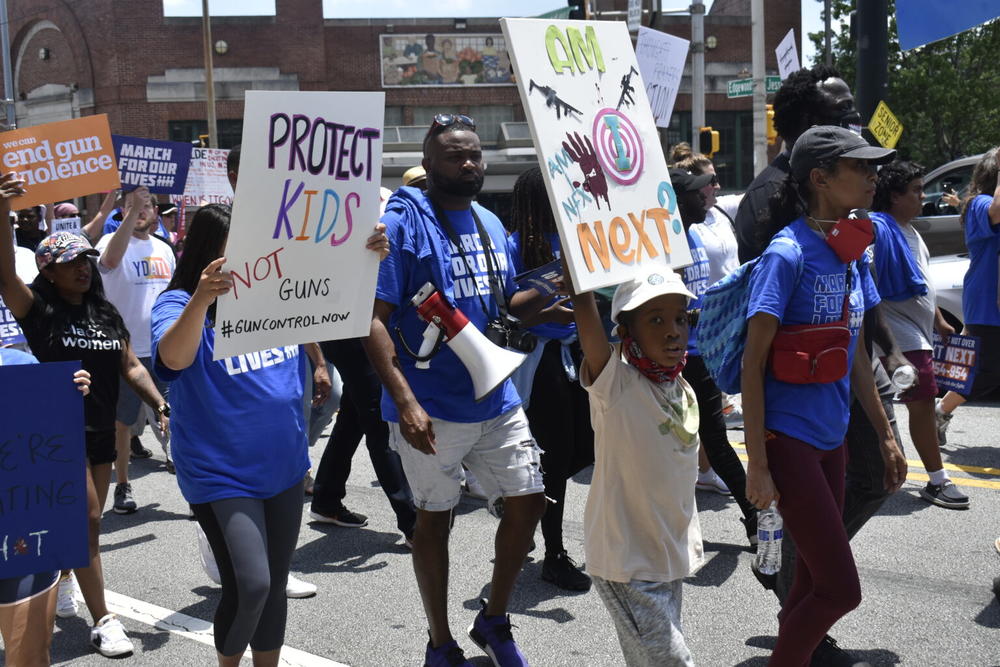  Students and adults marched through Atlanta June 11 to call for gun safety reforms.