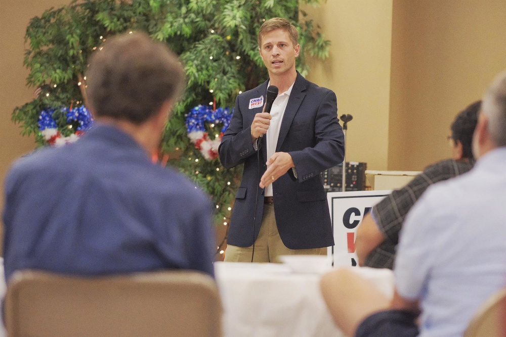 Chris West addresses the Bibb County GOP earlier in June 2022.