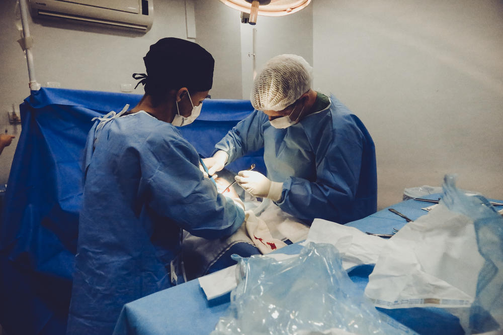 Doctor performing surgery