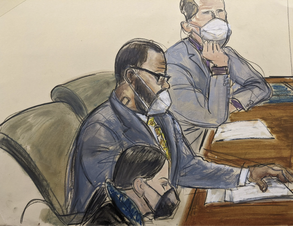 In this courtroom sketch, R. Kelly, center, sits with his defense attorneys Thomas Farinella, top, and Nicole Blank Becker during the first day of his defense in his sex trafficking case, Monday, Sept. 20, 2021, in New York. The former R&B superstar was convicted of racketeering and other crimes. (AP Photo/Elizabeth Williams)
