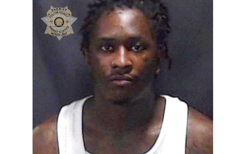 This booking photo provided by Fulton County Sheriff’s Office shows a booking photo of Atlanta rapper Young Thug. The Atlanta rapper, whose name is Jeffery Lamar Williams, was one of 28 people indicted Monday, May 9, 2022, in Georgia on conspiracy to violate the state's RICO act and street gang charges, according to jail records.