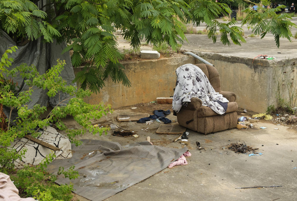 A left behind recliner at the Macon encampment. 