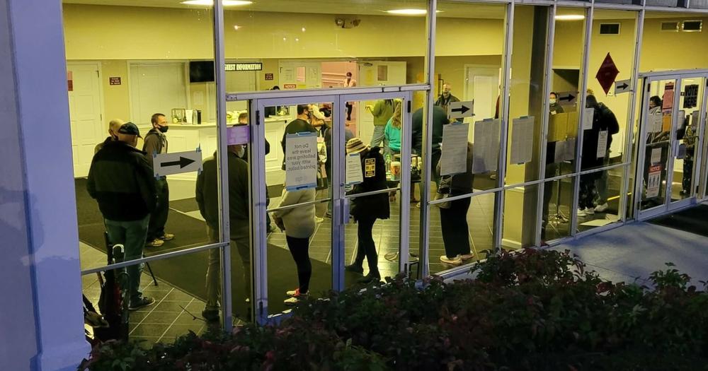 Voters who arrived early at Shiloh Hills Baptist Church in Kennesaw waited inside to stay warm until voting started in November 2020. 