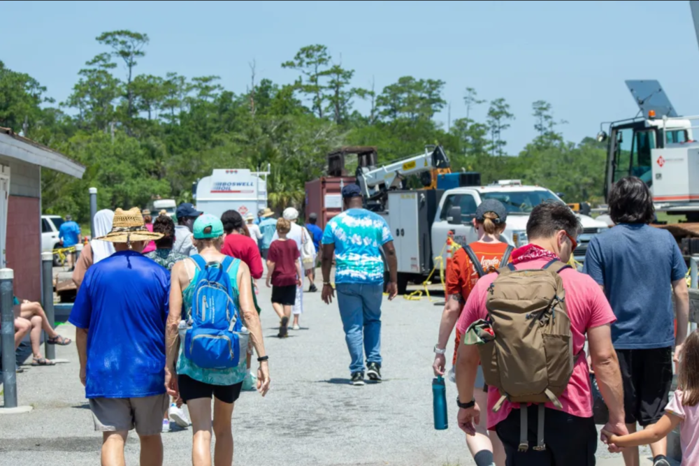 Tourists exit the ferry at the Sapelo Island Visitors Center.