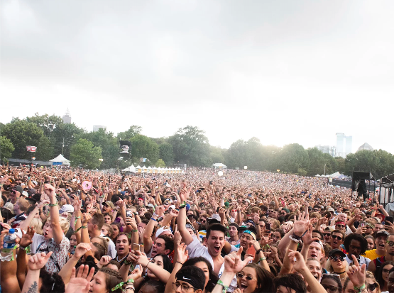 A crowd of people attends the Music Midtown festival in Atlanta's Piedmont Park on Sept. 16, 2018. (Paul R. Giunta/Invision/AP/File)