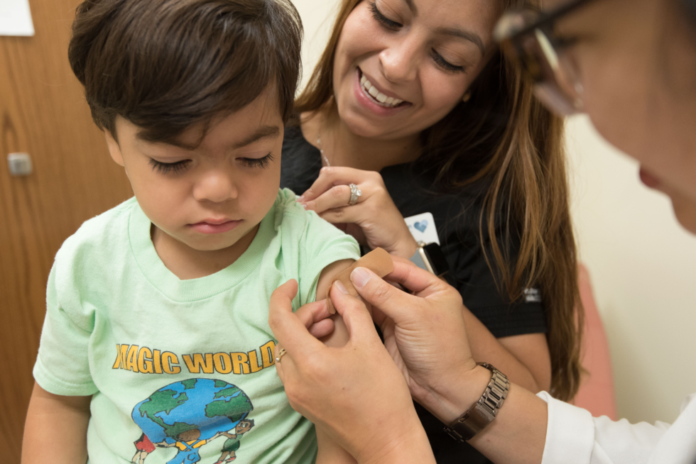 Child receiving vaccine