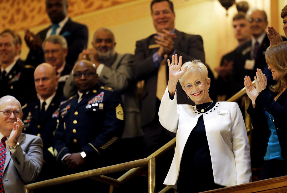 Sandra Deal waves as she is acknowledged by a round of applause before the State of the State address by her husband, Georgia Gov. Nathan Deal, on the House floor in Atlanta on Jan. 11, 2017. Sandra Deal died from brain cancer on Tuesday, Aug. 23, 2022, at age 80 at her home in Demorest, Ga. (AP Photo/David Goldman, File)
