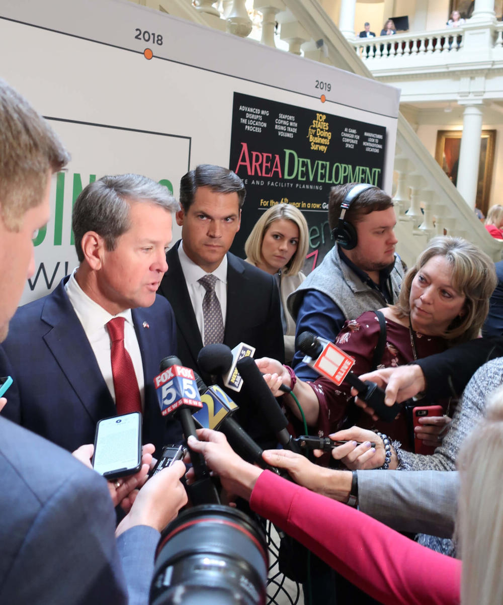 Gov. Brian Kemp answers questions from reporters at the state Capitol after unveiling the details of his proposed Medicaid waiver plan on Monday, Nov. 4, 2019. 